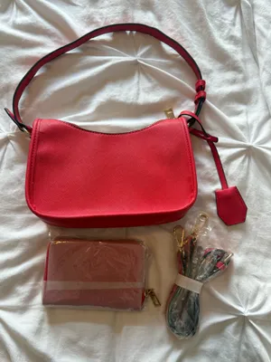 red purse with wallet and straps thumbnail 1