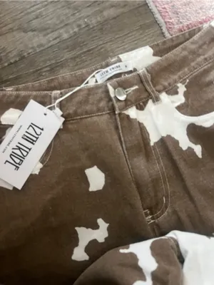 NWT 12th Tribe cow print jeans size small thumbnail 11