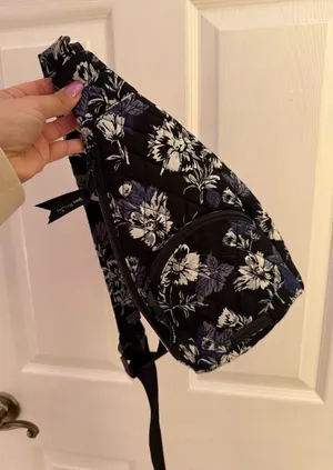 Vera Bradley Essential Compact Sling Backpack in the Frosted Floral pattern. thumbnail 1