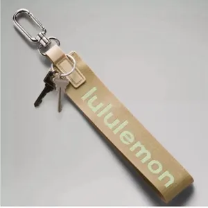 NEW & AUTHENTIC Lululemon Never‎ Lost Keychain Trench / Pistachio thumbnail 1
