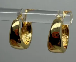 Dept Store 925 Sterling Silver Earrings 925 Sterling Silver with Yellow gold plated Huggies hoops earrings thumbnail 1