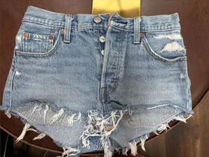 Levi's Light Blue Distressed Cutoff Jean Shorts thumbnail 1