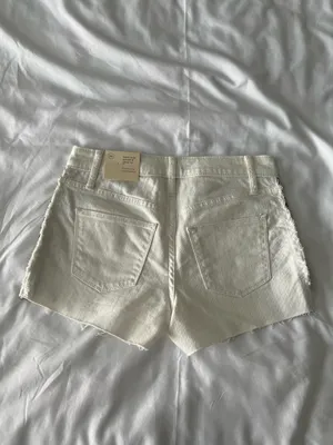 White High-Rise Raw Hem Shorts With Black Tribal Detail thumbnail 4