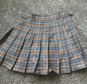 Pleated Gray & Tan Plaid Mini Skirt thumbnail 1