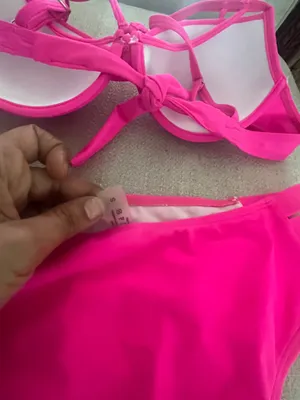 Make a splash with this vibrant pink bikini set. Perfect for a day at the beach or lounging by the pool. thumbnail 6