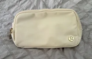 Lululemon Belt Bag - Cream with Gold emblems , Brand New. thumbnail 1