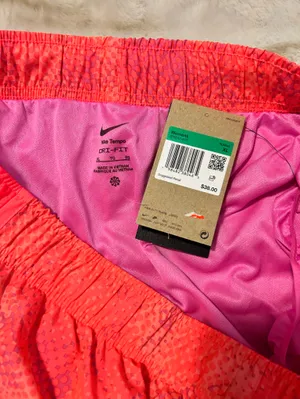 Nike Women’s Neon Coral Athletic Shorts thumbnail 4