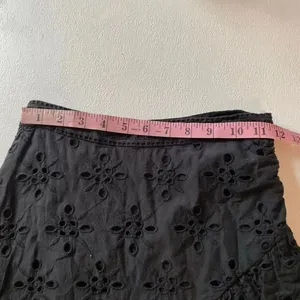 Express Black Eyelet Embroidered Ruffle Wrap Mini Skirt Size 0 thumbnail 6