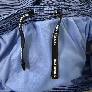 Nike Dri-FIT Womens Running‎ Shorts Blue Black Wave Print Size M Zip Pocket thumbnail 8