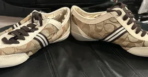 Women’s Coach Brown and Cream Sneakers Please see pics New but Peeling inside thumbnail 1