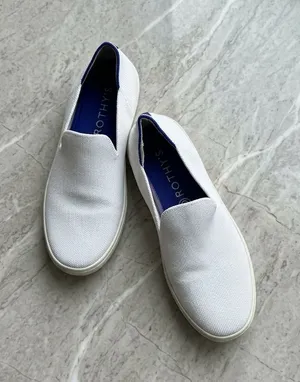 Rothy's Women’s White Slip-On Loafers with Navy Insole thumbnail 1
