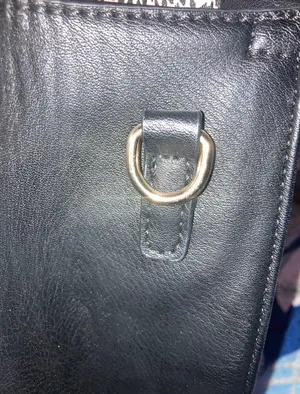 Black handbag/crossbody with red and white stipe Cheetah print interior design Plenty of zippers thumbnail 8