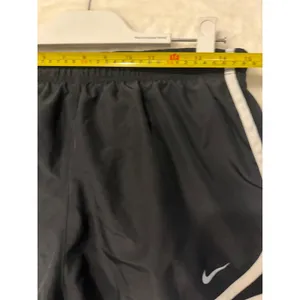 Nike Dri-FIT Tempo Running Shorts Black White Athletic Gym Training Womens Large thumbnail 6