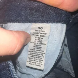 American Eagle dark wash distressed 00 raw hem jeans shorts thumbnail 3