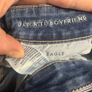 American Eagle distressed relaxed normcore boyfriend 12 jeans thumbnail 3