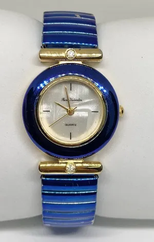 vintage René Valentine gold blue tone women’s watch 26mm round mop dial running thumbnail 1