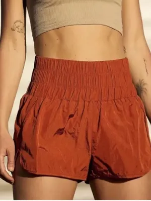 FP Movement by Free People The Way Home Running Shorts Rust Burnt Orange Size XL thumbnail 1