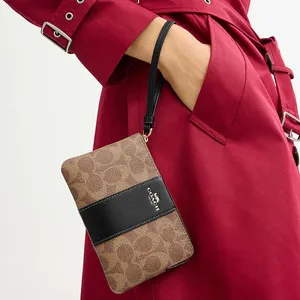 Coach Corner Zip Wristlet In Signature Canvas With Stripe thumbnail 2