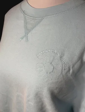 American Eagle Outfitters light blue sweatshirt with embroidered daisy design. Size - S thumbnail 3