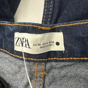 Zara Womens High Rise Wide Leg Dark Wash Denim Jeans Raw Hem Indigo Size 4 thumbnail 3