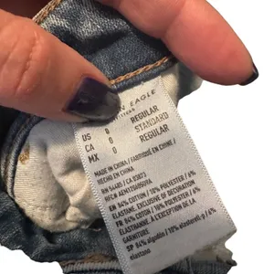 American Eagle Women’s Blue Distressed Shark Bite Fringe Denim Jeans Size 0R thumbnail 11