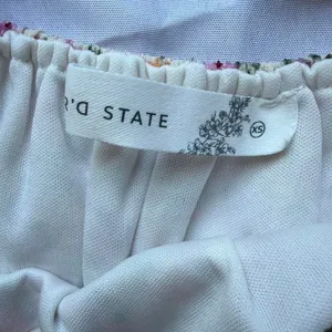 light pink floral top with tie back thumbnail 3