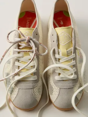 NWT FP Movement Lacoste Women’s Cream & Yellow Mesh Suede Club Low Sneakers thumbnail 1