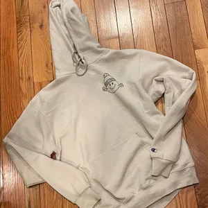 Champion Beige Hoodie with Bold Green Text thumbnail 1