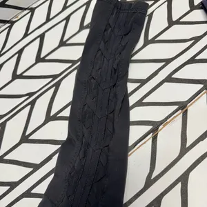 Lululemon Black Leggings with Sheer side panels with Criss Cross details- size 2 thumbnail 2