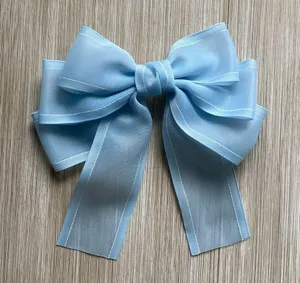 Light blue clip in hair bow thumbnail 2