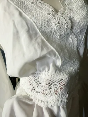 LOS ANGELES white lace V-neck long sleeve shirt top peplum tie cuff New with tag Smoke and pets free Same day shipping Elevate your wardrobe with this stunning white lace blouse from . The V-neckline and long sleeves add a touch of elegance to this top, while the peplum and tie cuff details create a flattering silhouette. The angel character and rose theme make it perfect for any occasion, from casual outings to formal events. Crafted from high-quality lace fabric, this blouse features adjustable features and is available in size S. The solid pattern and delicate lace accents make it a versatile piece that can be paired with any bottom. Whether you're dressing up or down, this Rose & Grey blouse is sure to turn heads. thumbnail 7