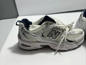 New Balance women’s sneakers in white and navy. Clean and stylish design with a comfortable cushioned insole and lace-up closure. Made in Vietnam. Size 9 US (40.5 EU / 25.5 CM). Great for everyday wear, walking, or casual outfits. Excellent condition thumbnail 11