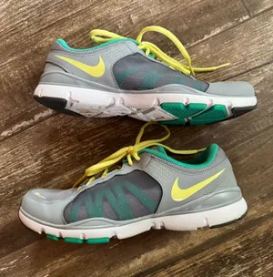 Nike Flex Trainer 2 athletic shoes with yellow & teal accents women’s size 8.5 thumbnail 1