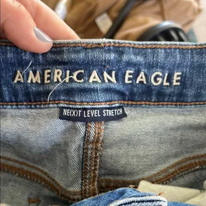 American Eagle Outfitters High Rise Blue Jeans with Distressing jegging thumbnail 9