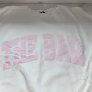 The Bar White Sweatshirt with Pink Lettering thumbnail 3
