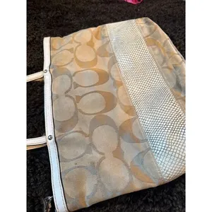 Signature coach bag with accent thumbnail 6