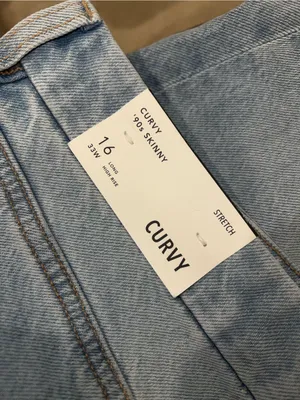 American Eagle Curvy '90s Skinny Jean in Stretch Ripped Destroyed Light Wash thumbnail 13