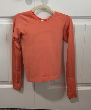 orange lululemon long sleeve swiftly tech thumbnail 1