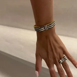 Coach Gold-tone Navy & White Striped Bow Bangle Bracelet thumbnail 2