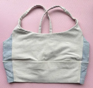 Vuori beige and gray sports bra thumbnail 1
