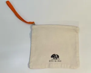 Origins Natural Canvas Wristlet with Orange Strap and Black Logo thumbnail 1