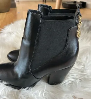 Michael kors black leather booties size 8.5 with charms in the back stylish mode thumbnail 1
