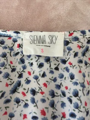 Sienna Sky White Floral V-Neck Cinch Waist Blouse with Navy & Red Accents thumbnail 2