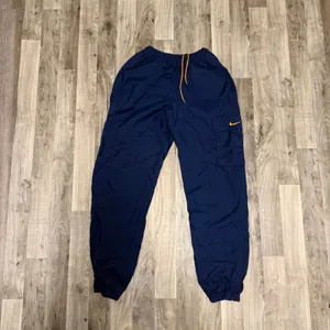 Vintage Nike Retro Navy Blue Baggy Cargo Windbreaker Track Joggers Small thumbnail 2