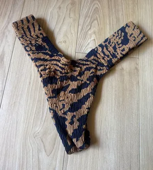 Montce Tiger-Print V-Front Bikini Bottoms in Black and Brown thumbnail 1
