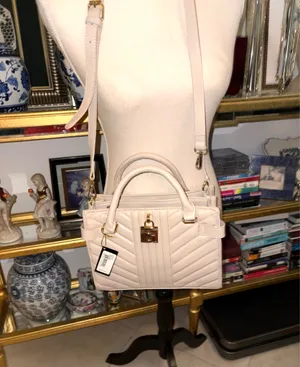 Bebe Aerin Blush Quilted Satchel bag in light pink (blush) with V-capped design and a distinctive gilded logo decorative padlock. thumbnail 3