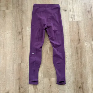 Alo Yoga Airlift Suit Up Stirrup Leggings in a gorgeous plum purple shade thumbnail 5
