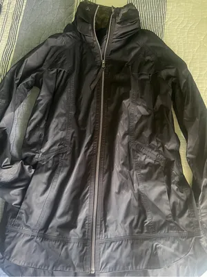 Lululemon fully waterproof rain jacket sz 4 with hidden hood thumbnail 2
