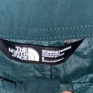 The north face dark green water resistant outdoor shorts thumbnail 4