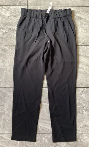 Lululemon On the Fly 7/8 Pant Black W5AUJS Size 6 Drawstring Jogger Trouser thumbnail 1